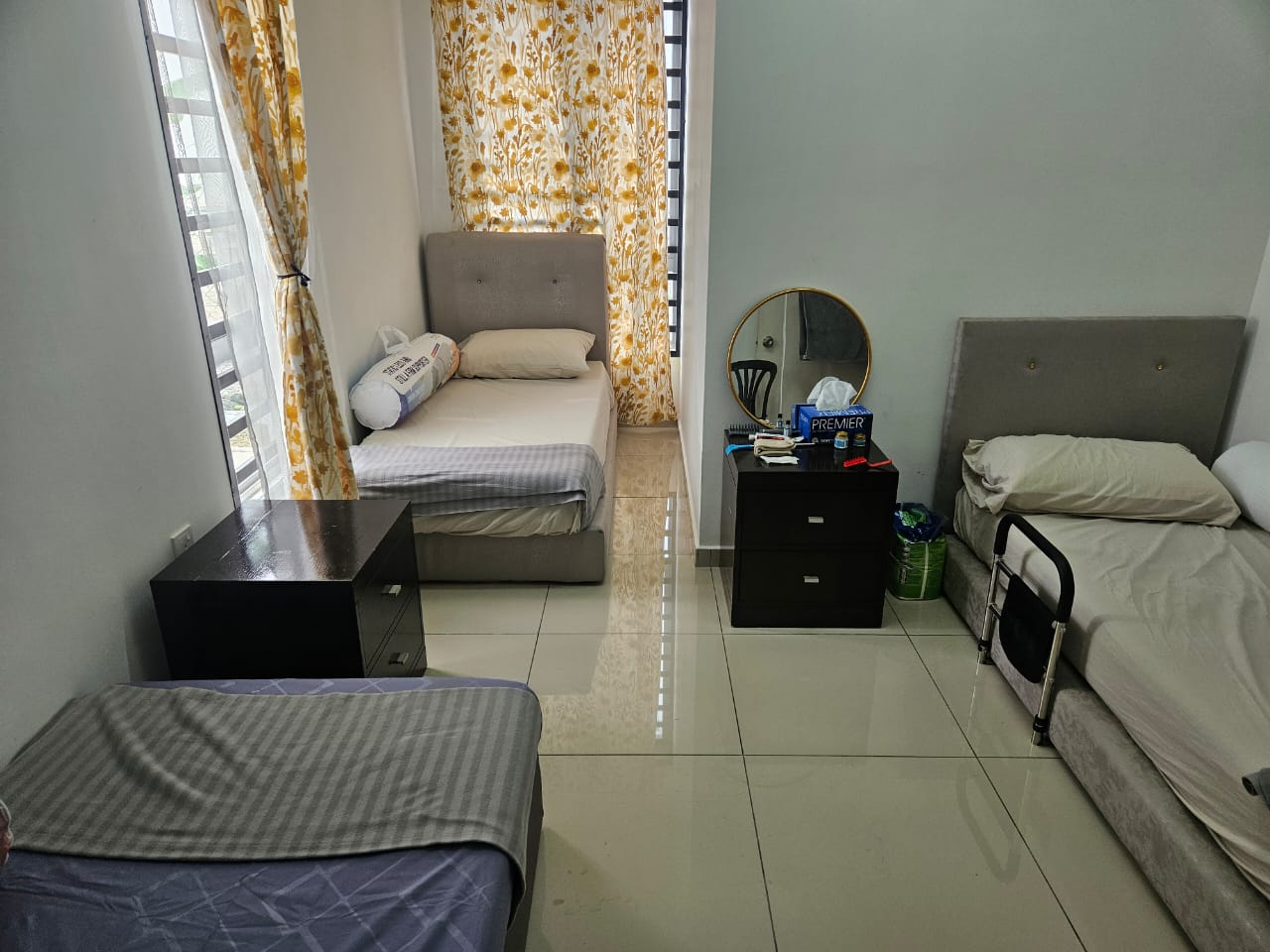 Shared bedroom with bed rails for resident safety, Gerbang Dzunnurayn