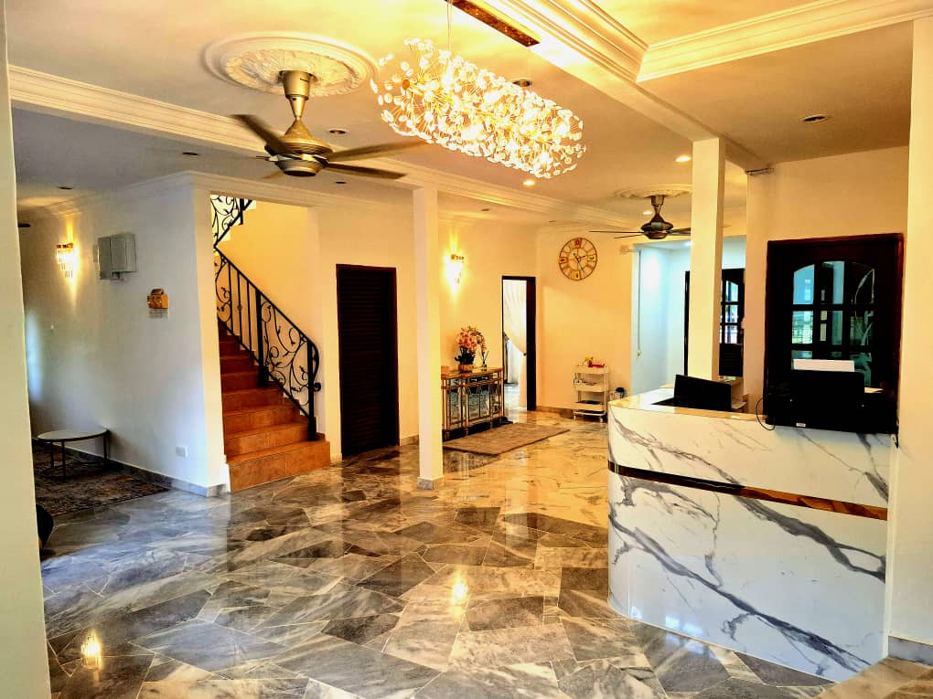 RH Elderly Care Centre Seremban lobby with marble flooring, chandelier, and reception counter