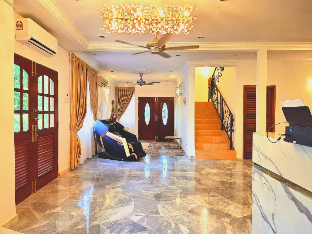 RH Elderly Care Centre reception lobby with massage chair and marble floors