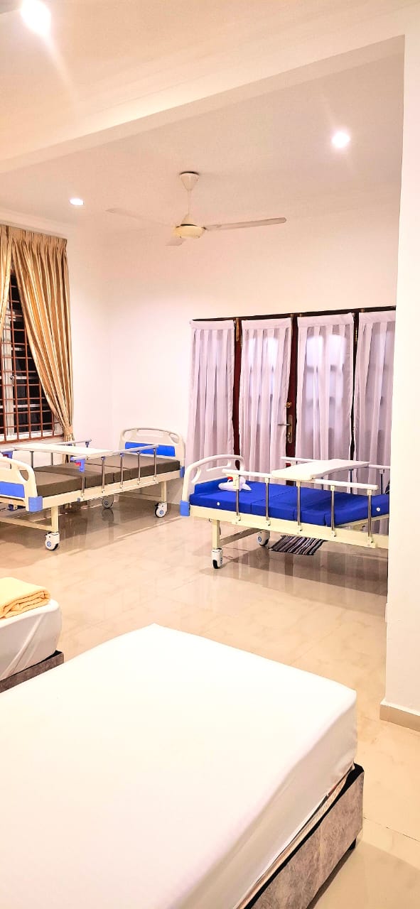 RH Elderly Care Centre hospital ward with 3 full-rail beds for bedridden residents