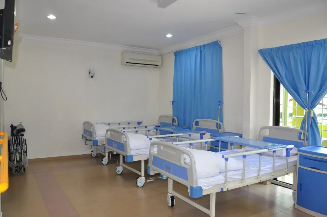 Resident ward room with hospital beds at Golden Age Care Centre Melaka