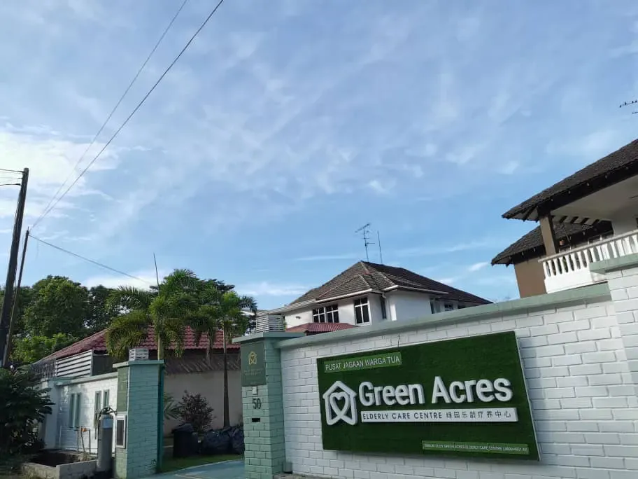 Green Acres Elderly Care Centre entrance sign and bungalow buildings, Taman Bukit Kempas JB