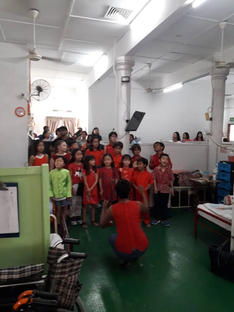 Children performing for residents at Rebina Sunrise Nursing Home