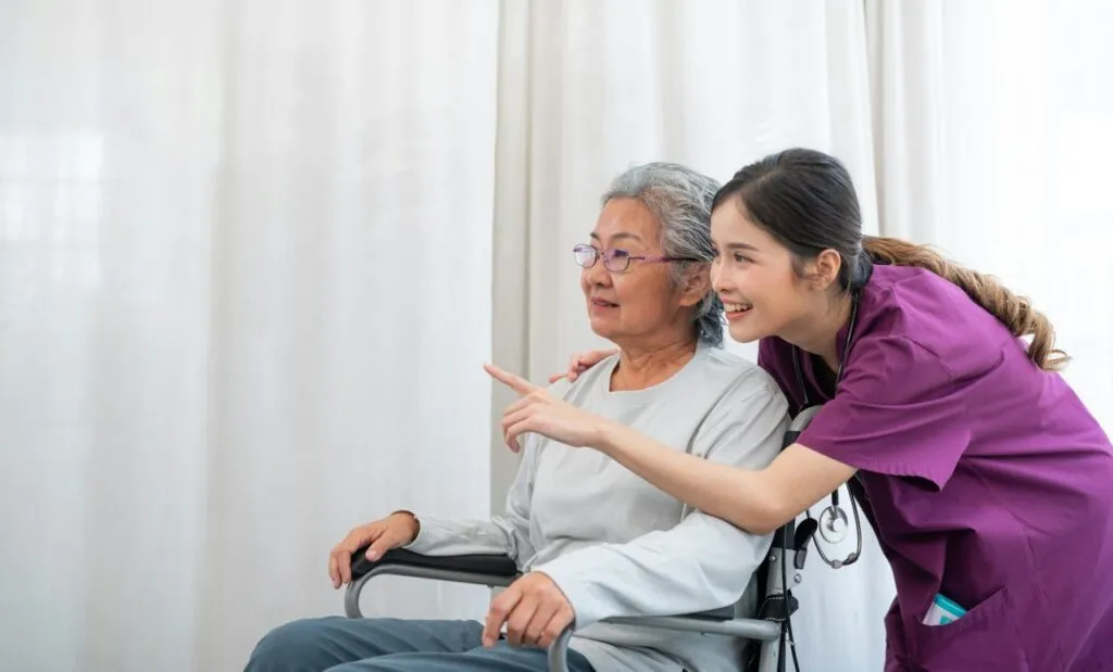 Noble Care nurse with resident