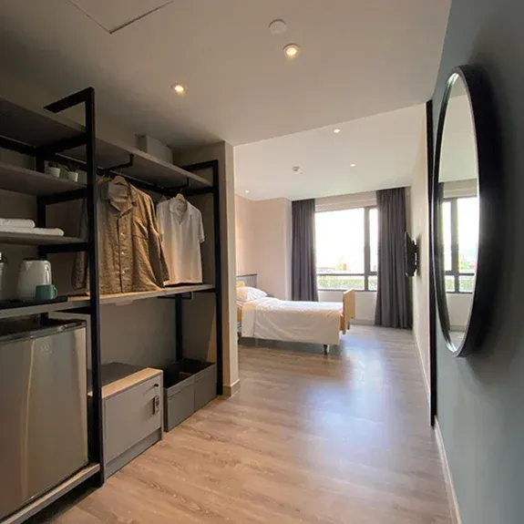 Modern furnished assisted living suite at Komune Care Cheras
